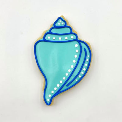 conch shell decorated sugar cookie from southern home bakery in orlando, florida