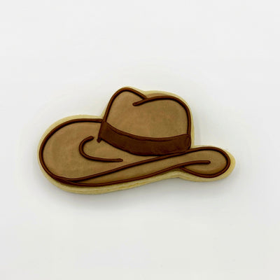 Custom, hand-decorated cowboy hat sugar cookie from Southern Home Bakery in Orlando, Florida