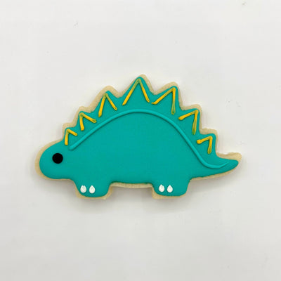 Custom Stegosaurus dinosaur decorated sugar cookie from Southern Home Bakery in Orlando, Florida