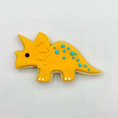 Custom triceratops dinosaur decorated sugar cookies from Southern Home Bakery in Orlando, Florida