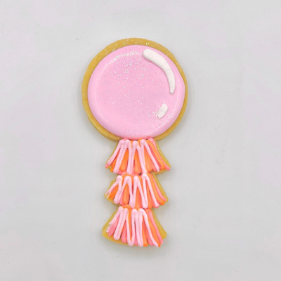 Custom decorated balloon tassel cookie from southern home bakery in orlando, florida