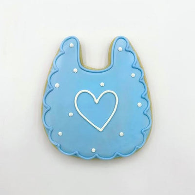 Custom decorated blue bib sugar cookie by Southern Home Bakery in Orlando, Florida