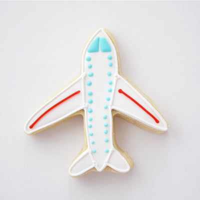 Custom decorated Airplane sugar cookie by Southern Home Bakery in Orlando, Florida.