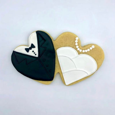 Custom decorated bride and groom double heart sugar cookie by Southern Home Bakery in Orlando, Florida