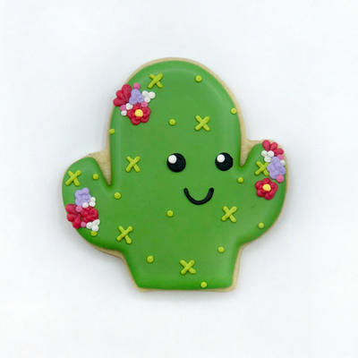 Custom decorated happy cactus sugar cookie by Southern Home Bakery in Orlando, Florida.