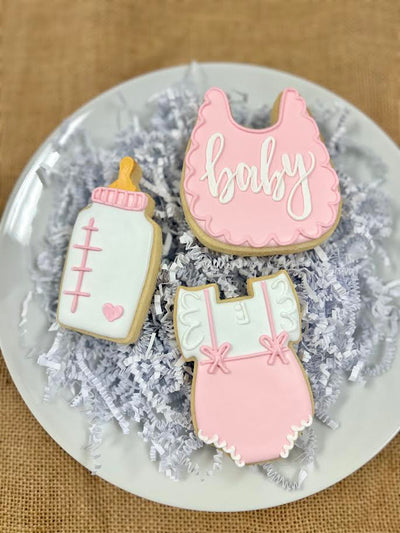 Custom decorated Pink Baby sugar cookie set by Southern Home Bakery in Orlando, Florida.